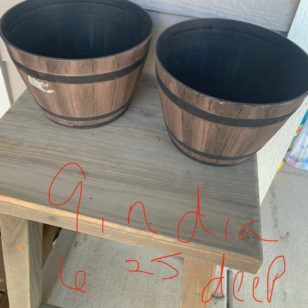 SOLD outside of Posh   Barrel looking planters